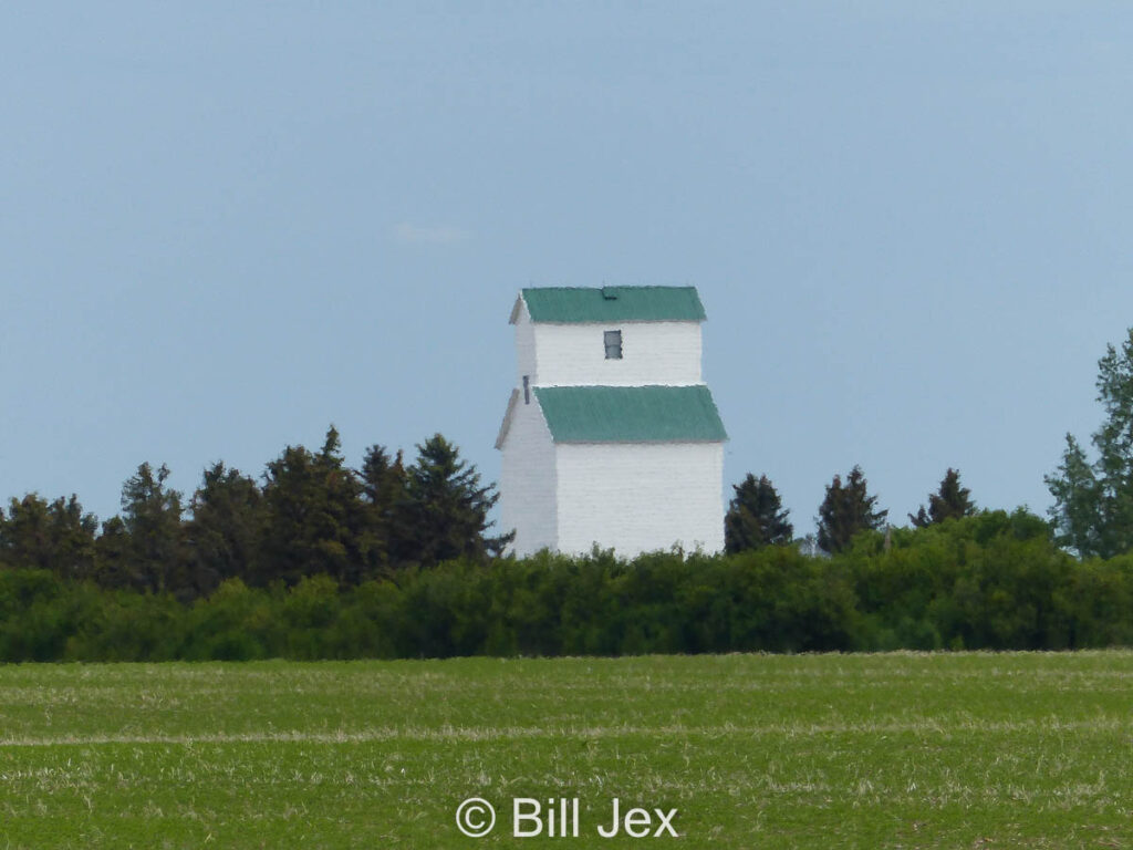 Small farm elevator west of Tessier, SK, June 2022. Contributed by Bill Jex.