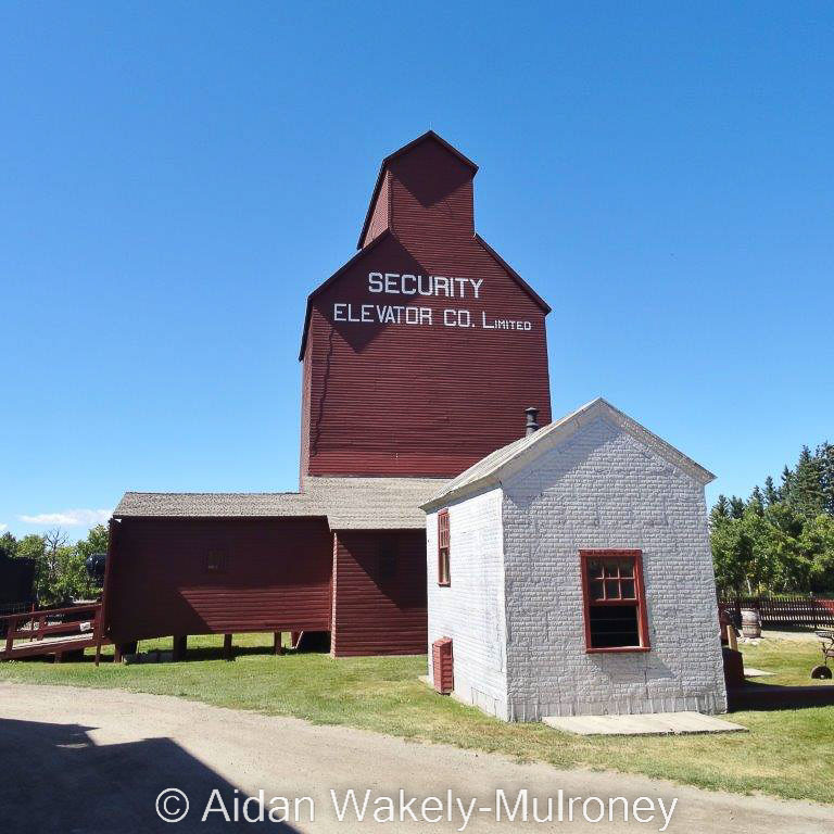 Brown grain elevator lettered for SECURITY ELEVATOR CO. LIMITED