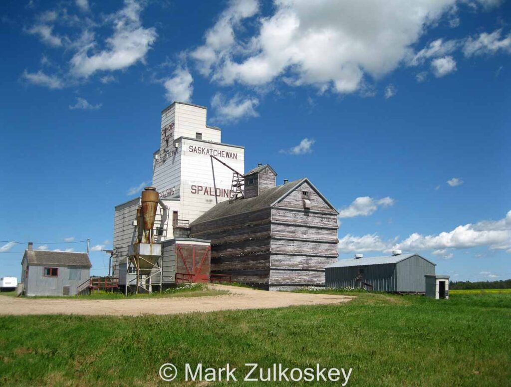 Colour photograph of wooden grain elevator in Spalding SK