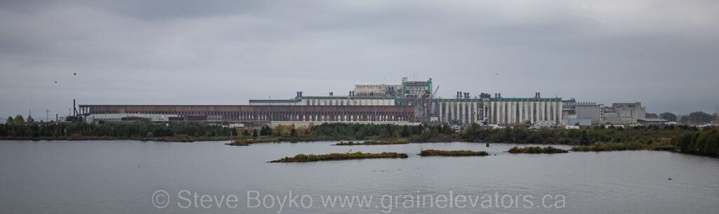 Foggy view of concrete grain elevators in Thunder Bay Ontario