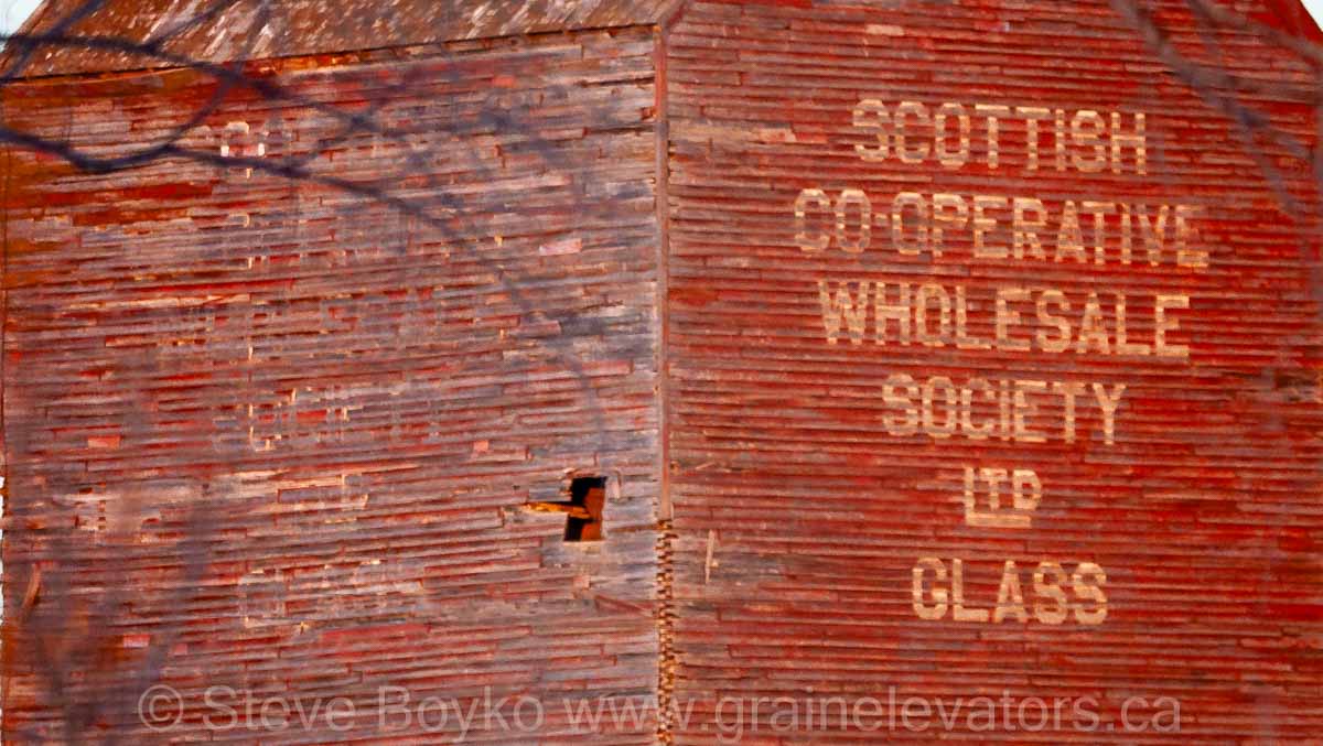 Lettering on the side of a red grain elevator